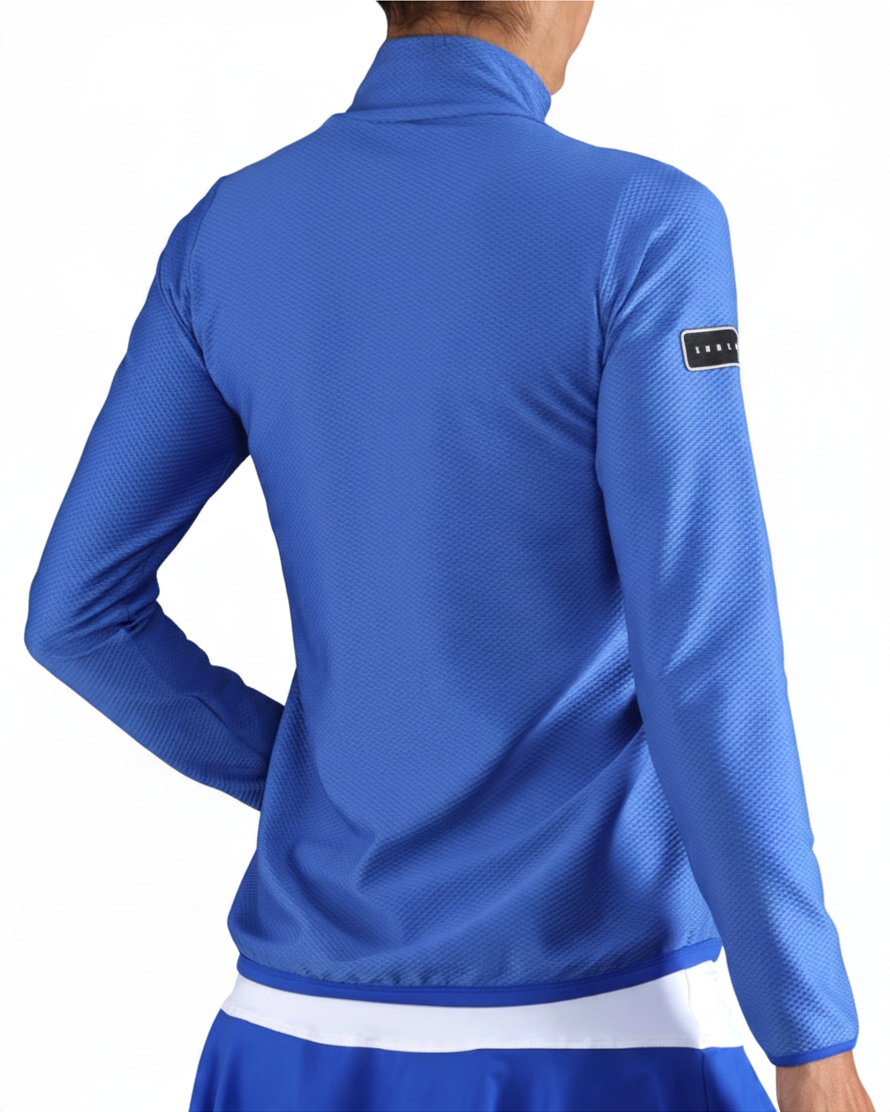 Chaqueta deportiva Endless azul de mujer con cuello alto, tejido elástico y logo en la manga, vista trasera.