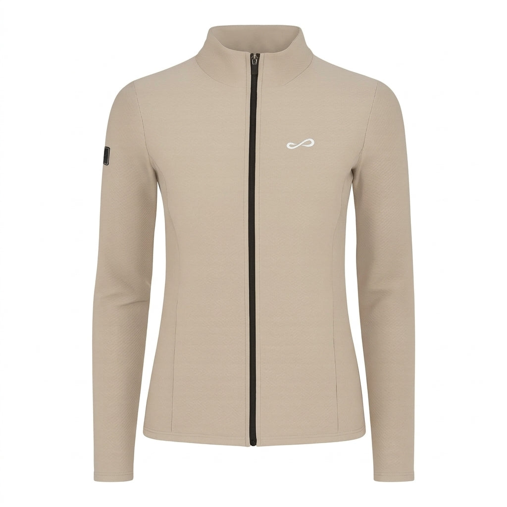 Chaqueta deportiva Endless MX Lithe color beige con cuello alto, cremallera frontal y tejido elástico transpirable.