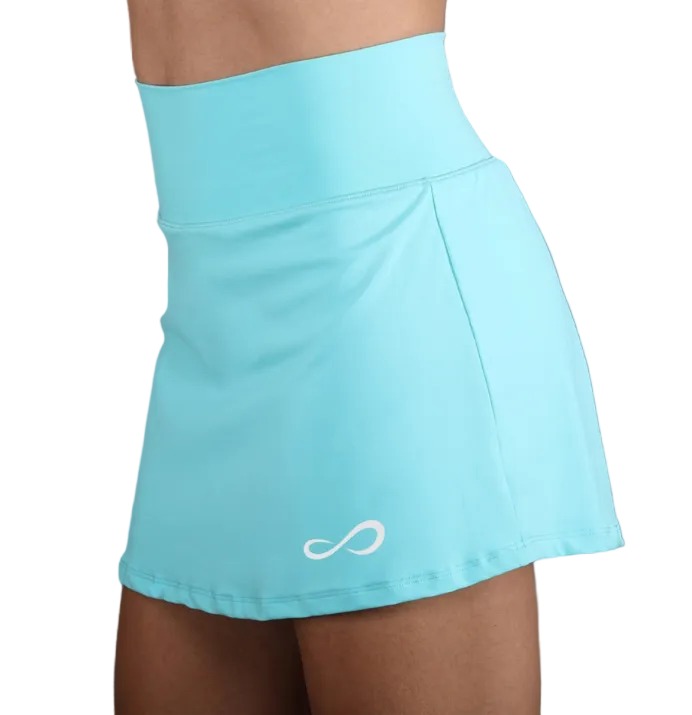 Falda deportiva Endless MX color aqua con cintura alta, tejido elástico y short interior para tenis y pádel.