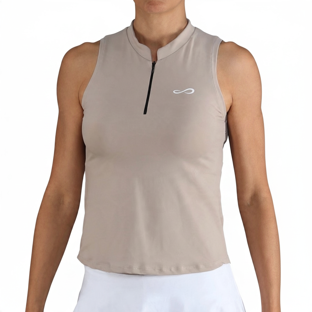 Polo deportivo Endless MX sin mangas en color beige con cremallera invisible, tejido elástico y transpirable.